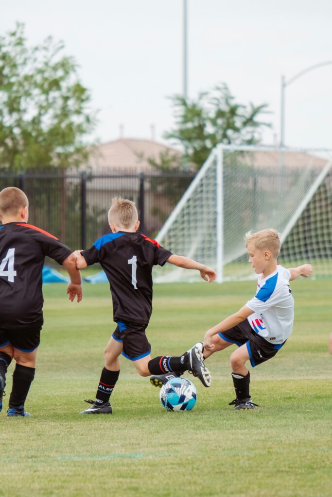 Tips Beginner Soccer Players Kids playing soccer.